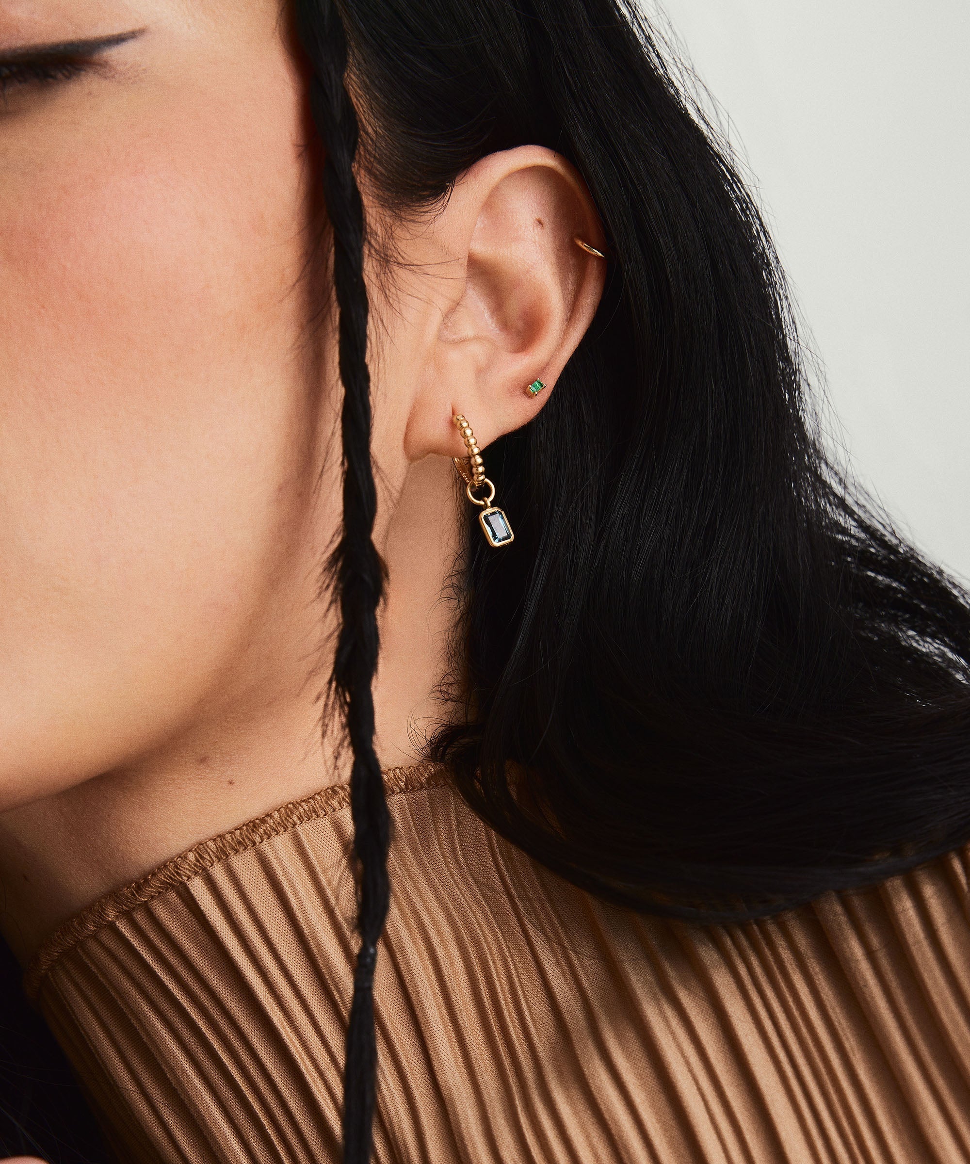 1-14KNECKLACESFLATBACKSTUDS_SoloBaguetteEmeraldFlatBackStud_14k_Stack_004_11c874d5-a843-44b4-bf90-62af5b94cc14