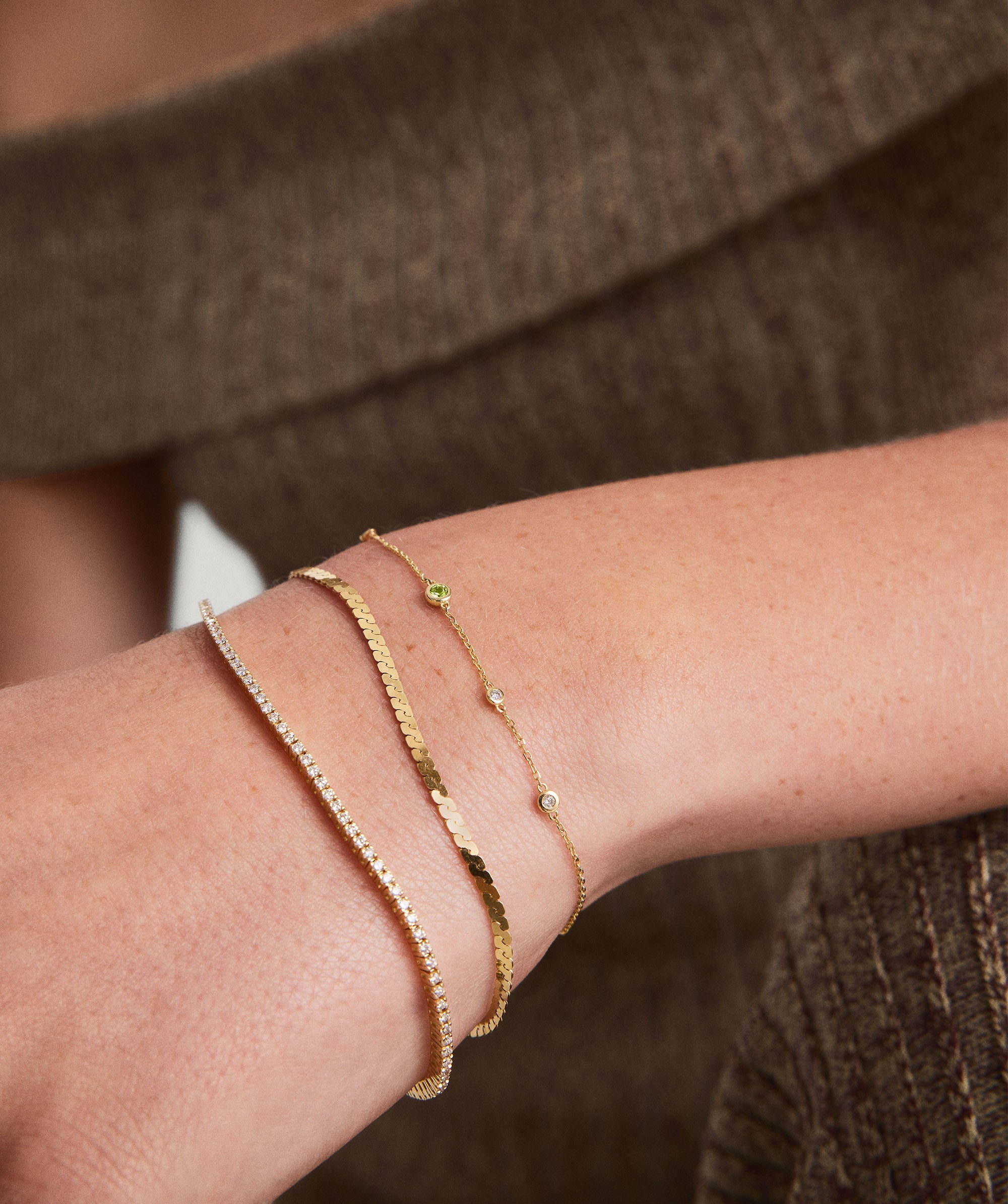1-BIRTHSTONEBRACELETS_BirthstoneBraceletAugustPeridot_14k_Stack_022_457d5447-b26a-4d74-8f5d-7f7275cb7eff