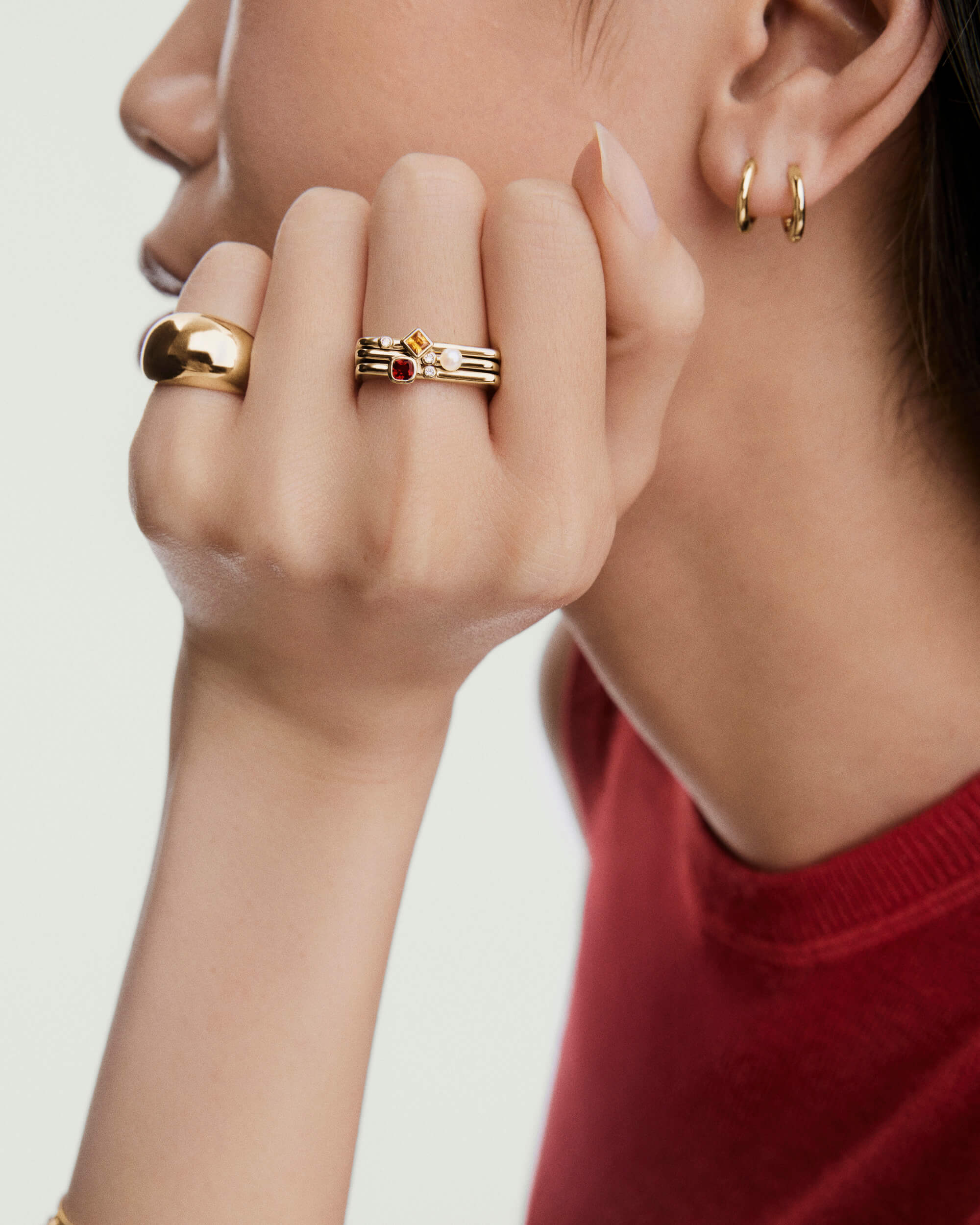 1-PuzzleStackingRings_Garnet_V_OnFig_027_d2e97040-ff73-4096-b65e-c41fd382ec67