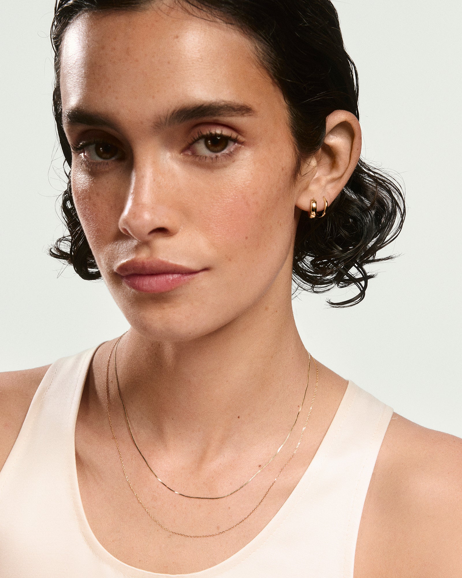 1-Under300Necklaces_0.90mmBabySerpentineNecklace_YG_OnFigStacked_034