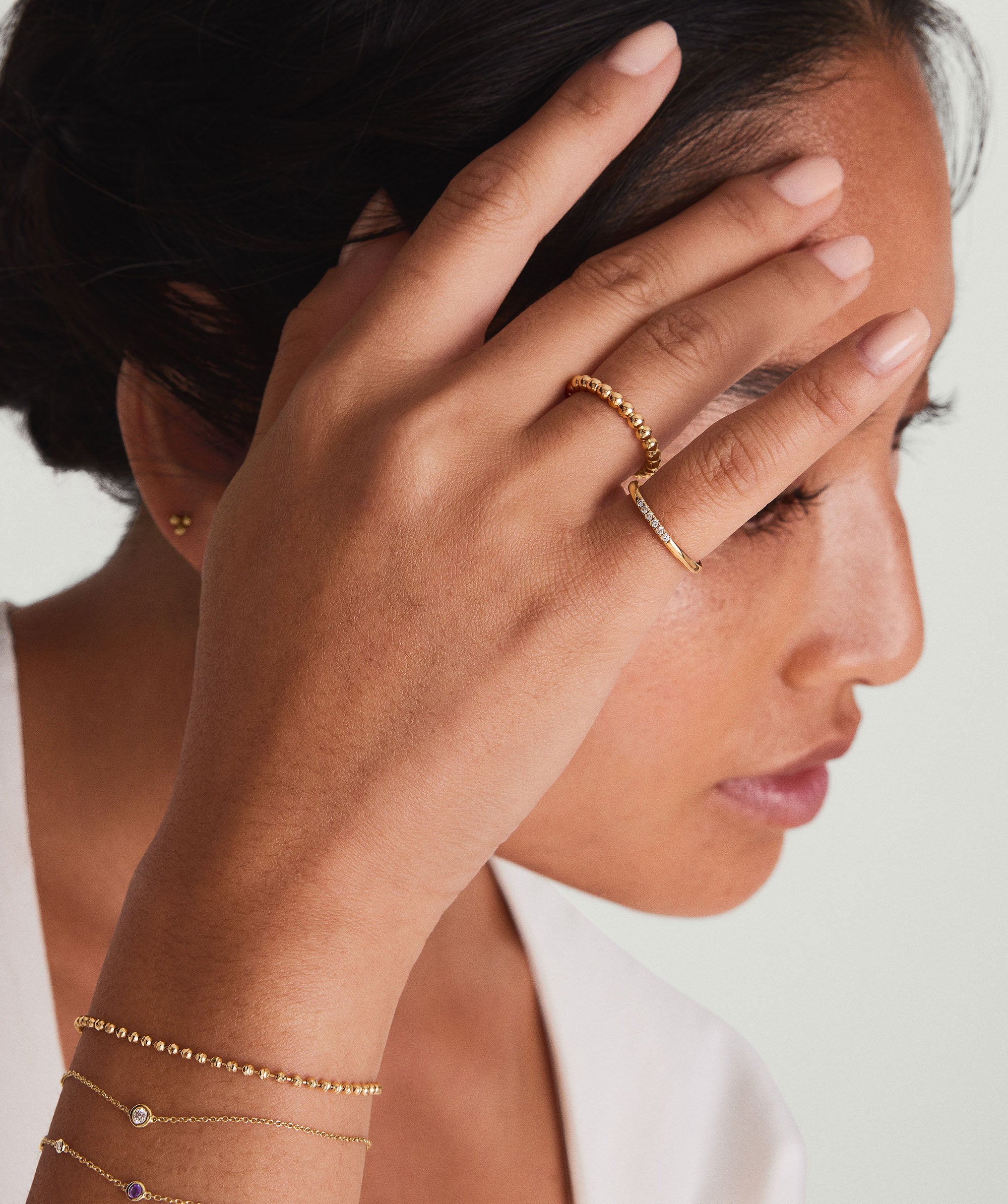 2-BIRTHSTONEBRACELETS_BirthstoneBraceletFebruaryAmethyst_14k_Stack_014-1