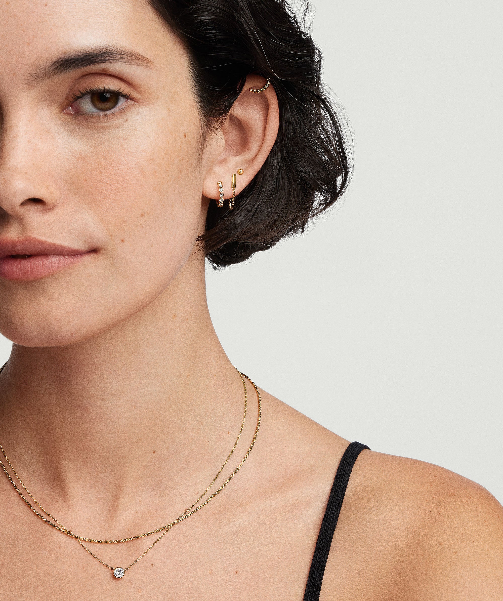 2-LABGROWNDIAMONDSBEZEL-BabyBezelHuggieHoop-14K-Stack_075_fc05da74-c3ba-4a90-8aca-553305157ed8