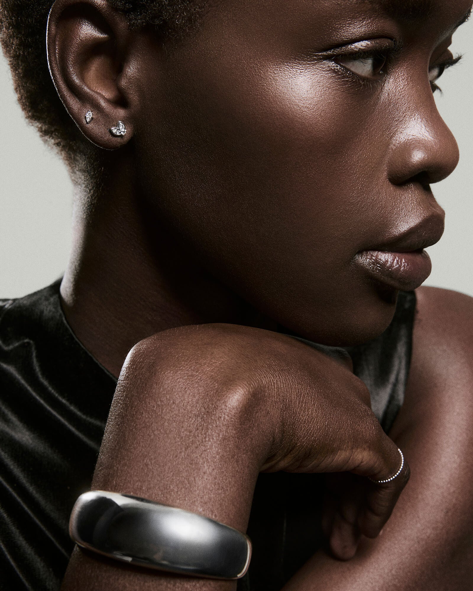 3-EarStylingStudRefresh_PiercingStudio_TinyMarquiseDiamond_WG_OnFigStacked_044